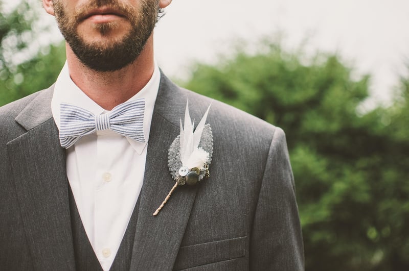 Groom in navy suit
